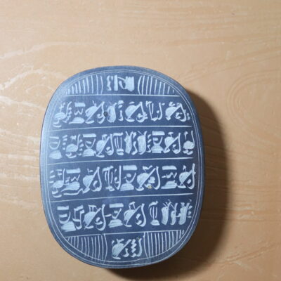Hand-Carved Black Stone Scarab with Hieroglyphic Inscriptions