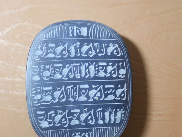Hand-Carved Black Stone Scarab with Hieroglyphic Inscriptions